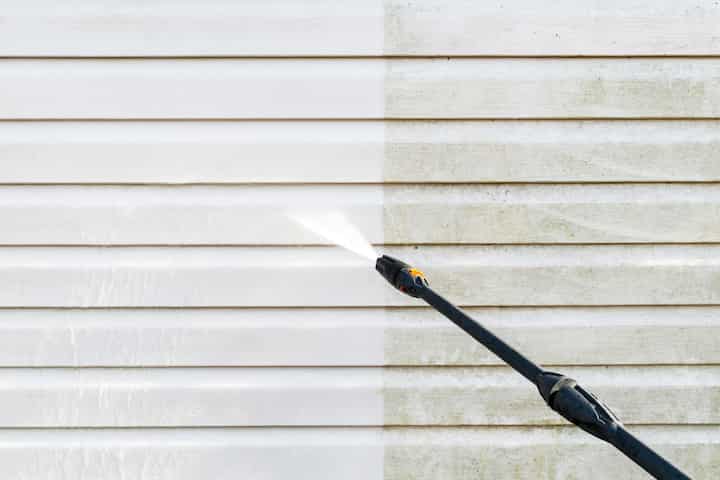 Residential exterior power washing in Ames, IA: Before and after transformation.